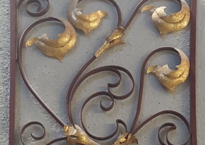 Cabecero de metal dorado y pintado acrilico